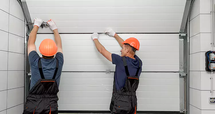 Garage Door Bottom Panel Repair in Pensacola, FL